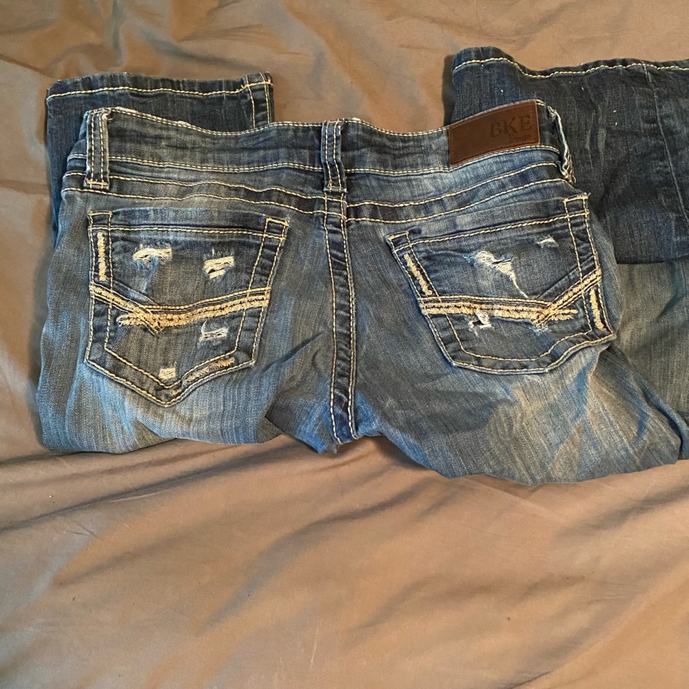 Distressed bootcut jeans